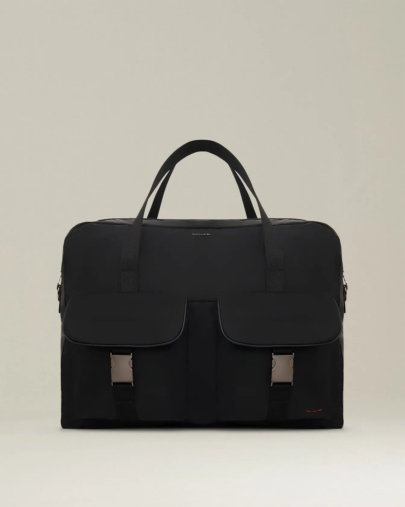 BRIEFCASE WITH LEATHER INSERTS