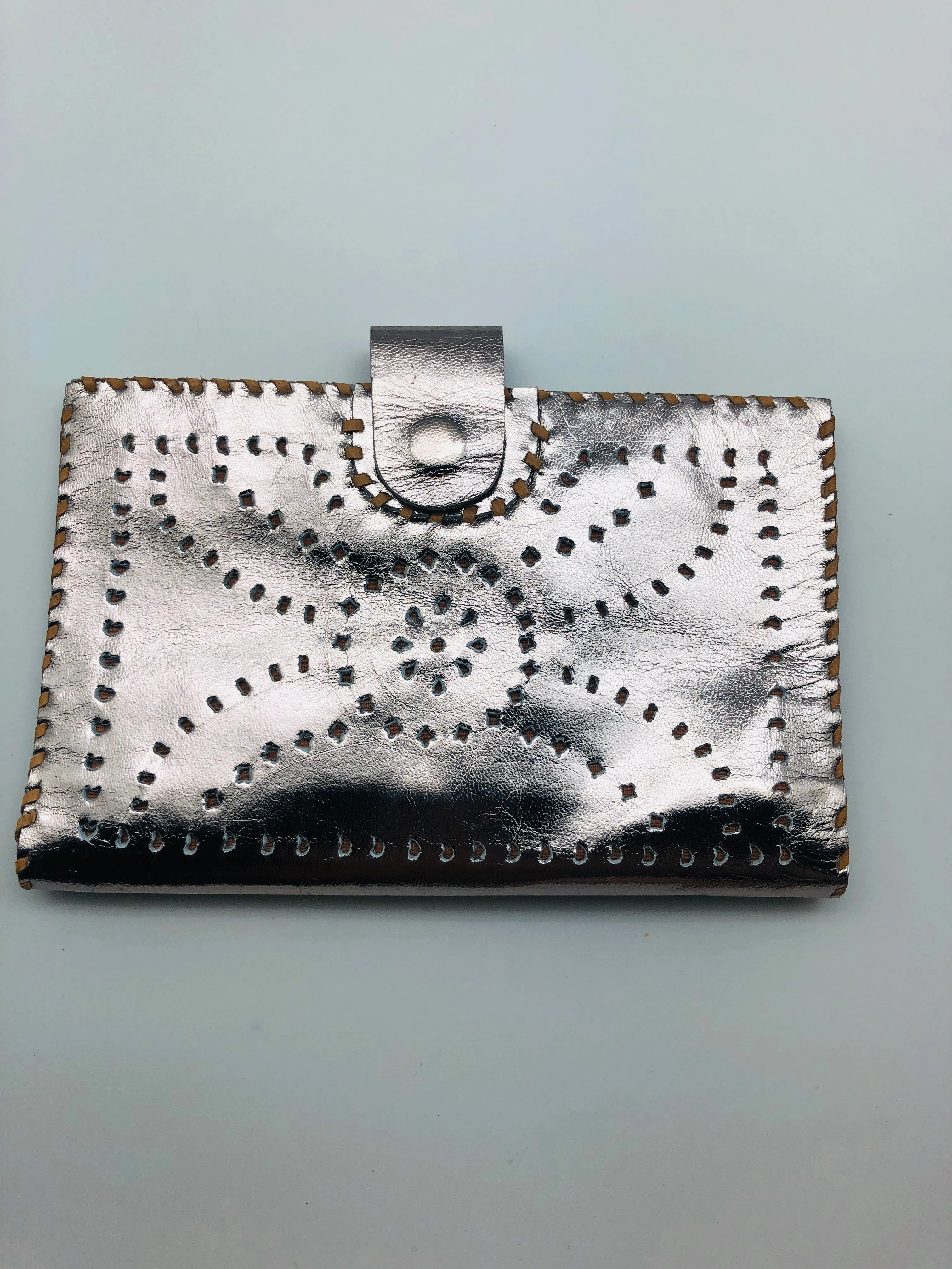 PUNCH LEATHER PASSPORT HOLDER